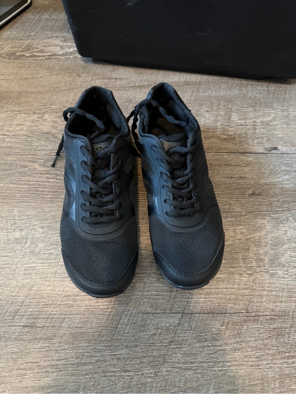 Spotlight Black cheer shoes.